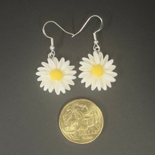 White flower earrings with yellow centers