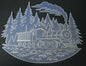 Metallic train cutout with trees and mountains on a black background